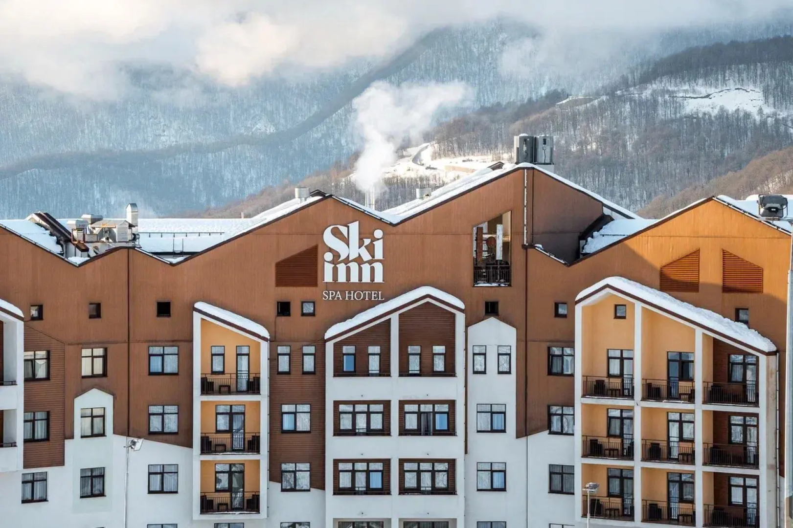 Отель Ski Inn SPA Hotel Rosa Khutor