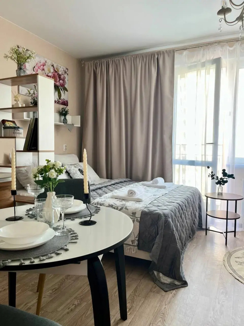 Квартира Уютная студия в 5 минутах от ТРЦ Планета