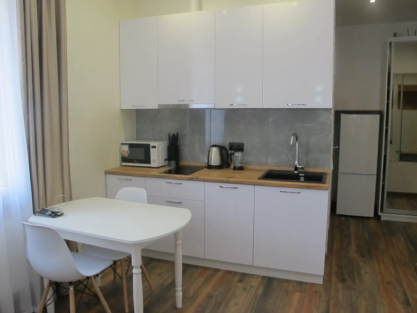 Апартаменты на Воскресенской 14/1