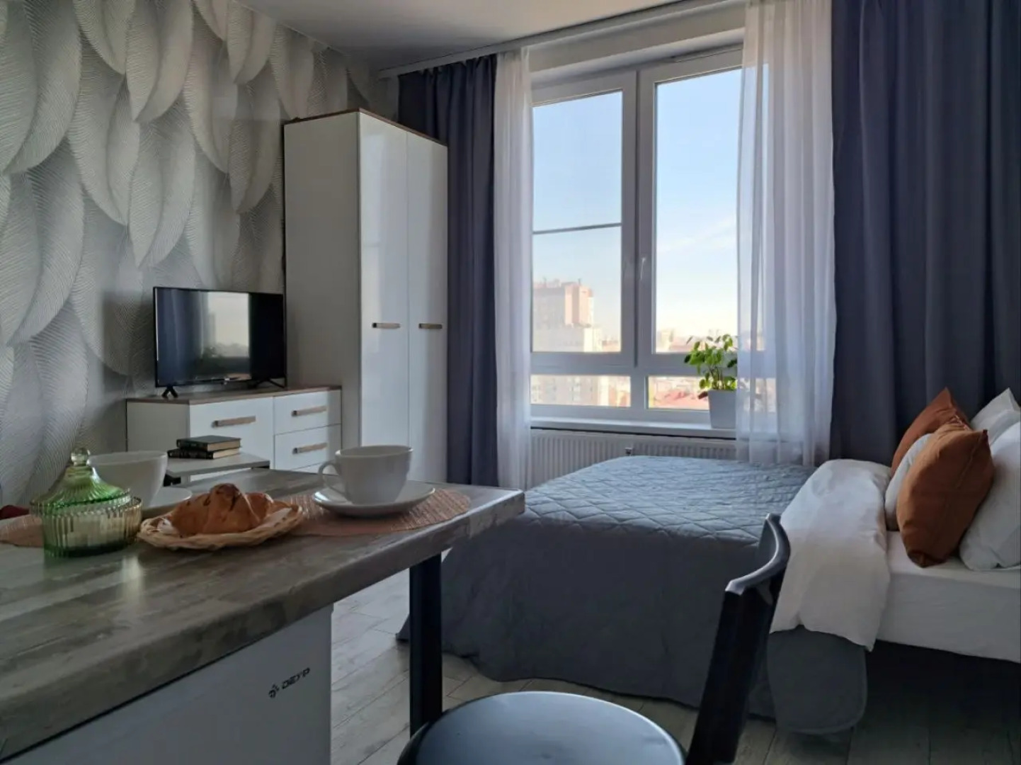 Апартаменты Wing Tower - высотная студия в центре