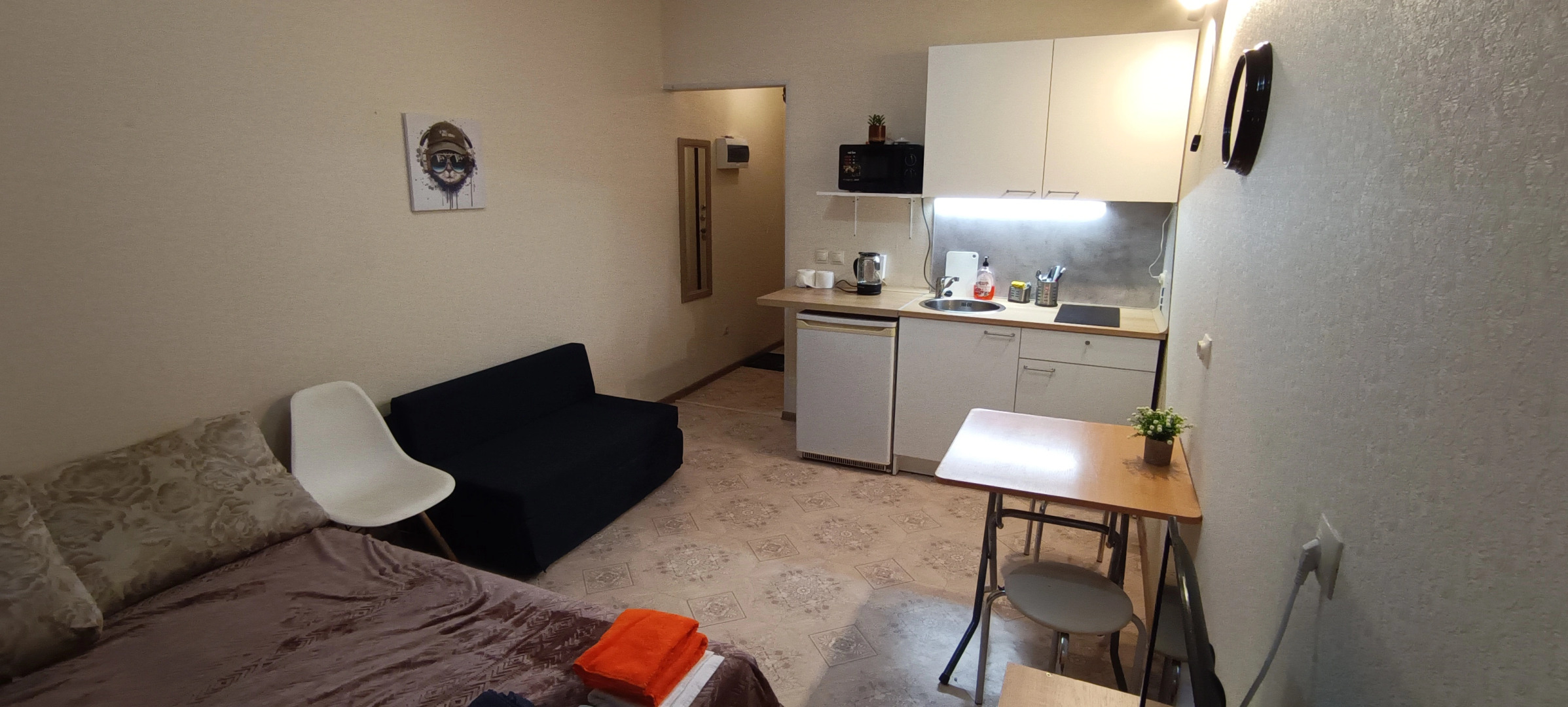 Квартира Студия на Охтинской аллее 8