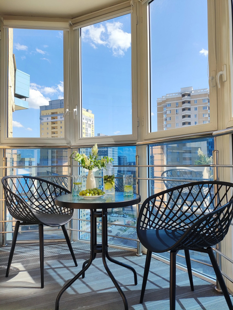 Квартира Светлая студия в современном жилом комплексе.