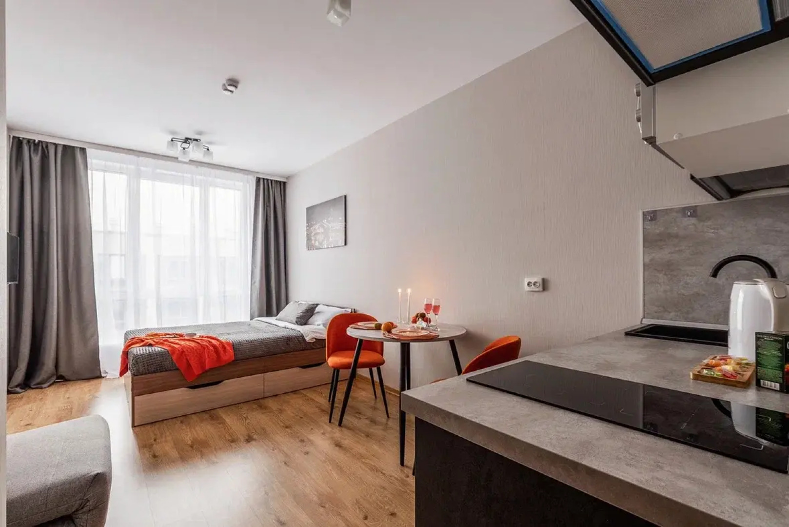 Апартаменты Уютная студия у метро Парнас