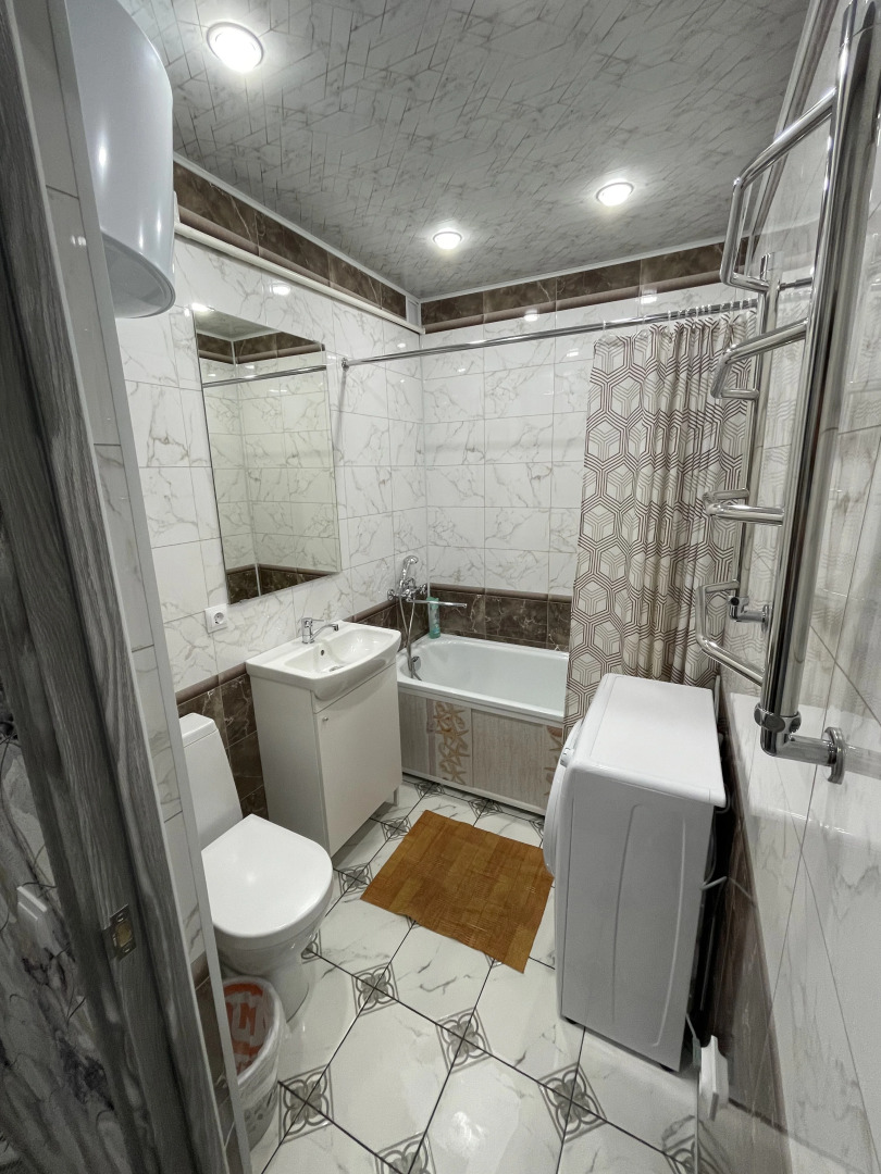 Апартаменты на Проспекте Строителей 27-4