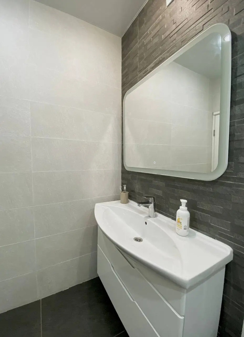 Апартаменты в Центре Города  на Высоком Этаже