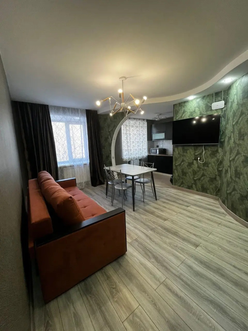 Апартаменты Уютная двухкомнатная квартира в центре