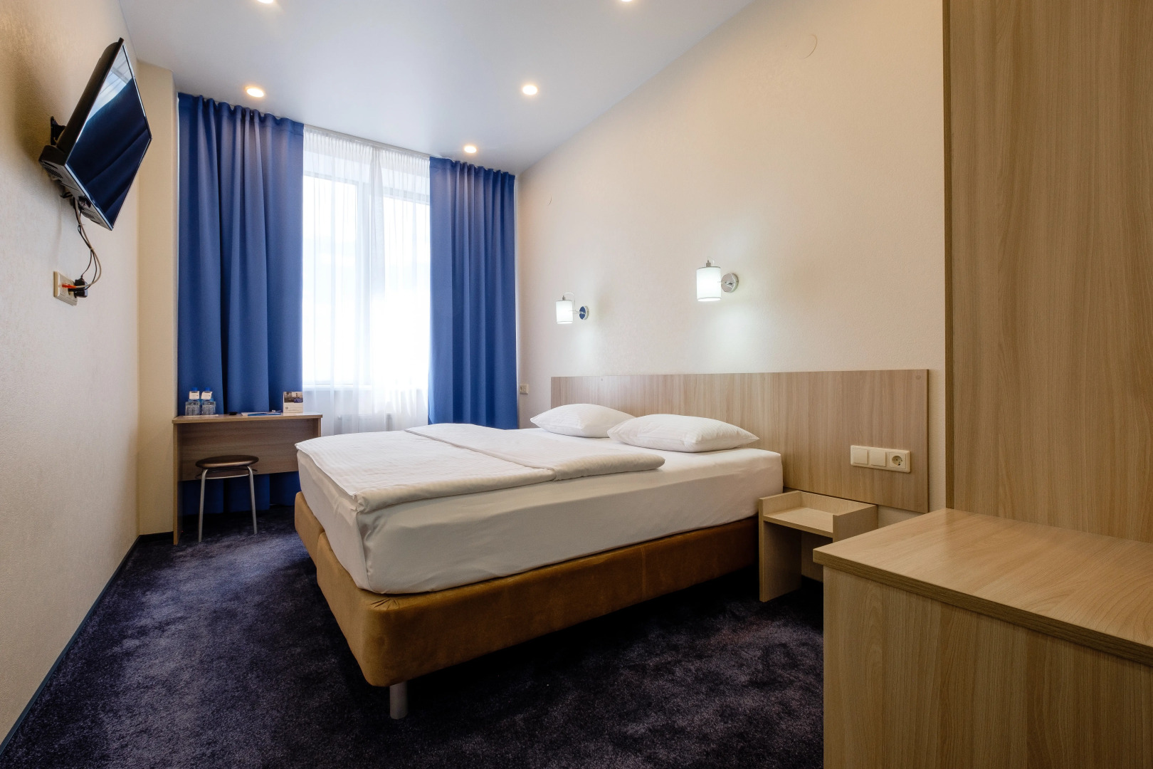 Отель Коматек