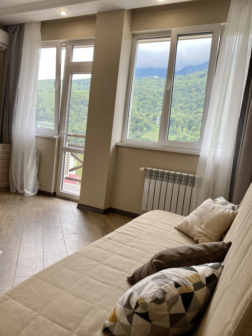 Апартаменты с Балконом у Подножия Хребта Аибга