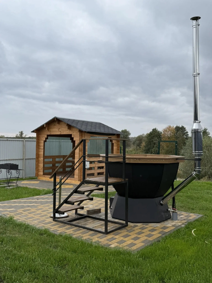 Частный дом На берегу реки с банным чаном