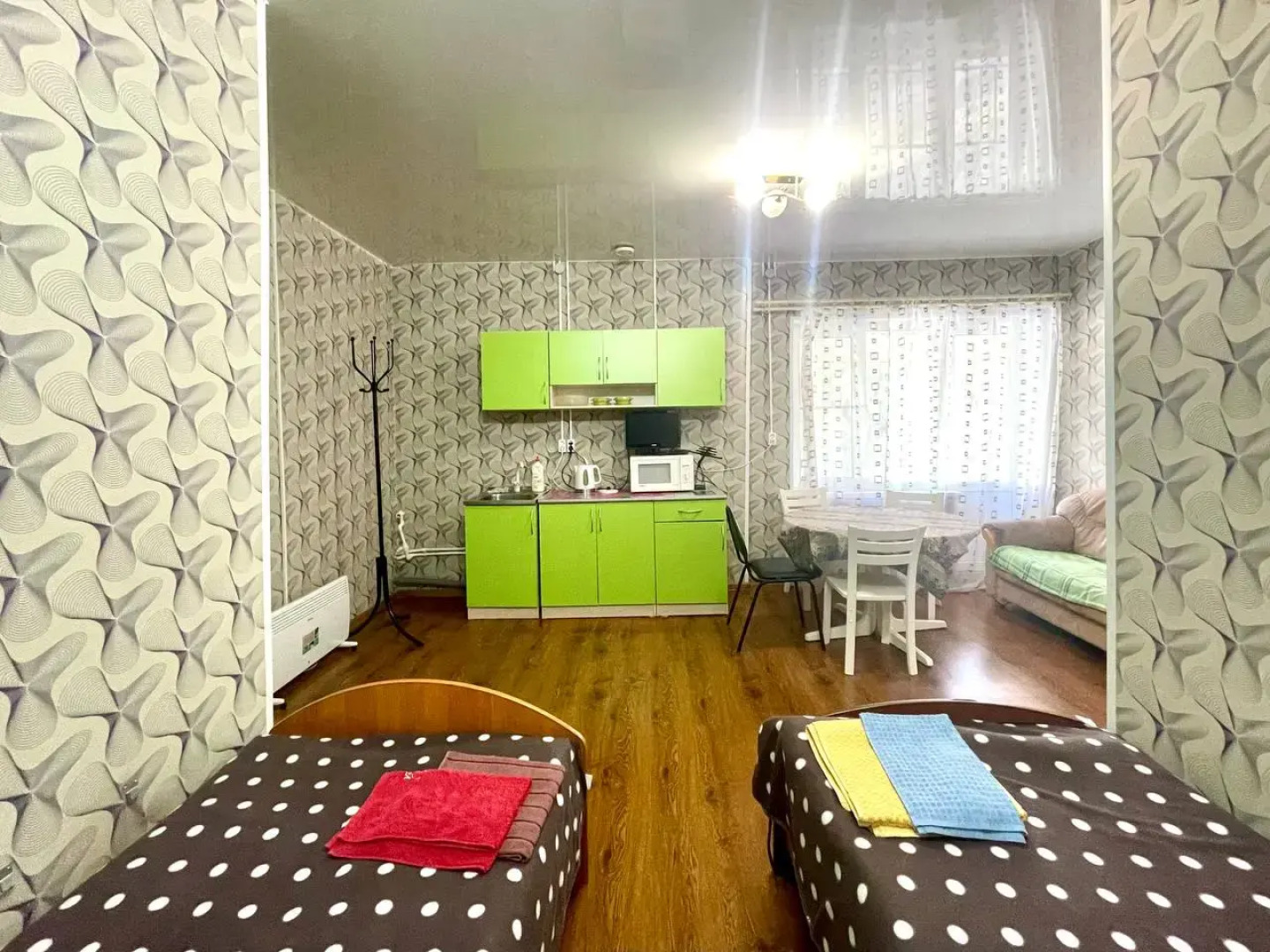 Апартаменты С кухней гостиной и отдельной спальней