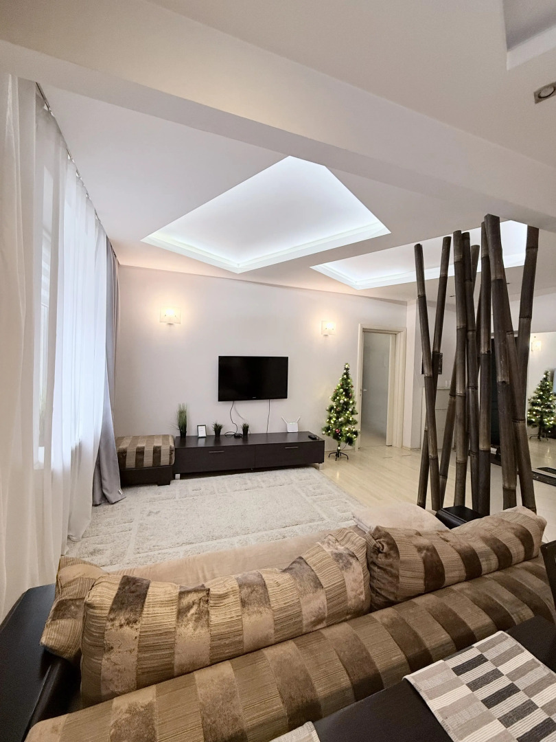 Апартаменты Уютная двухкомнатная квартира рядом с ЦУМом