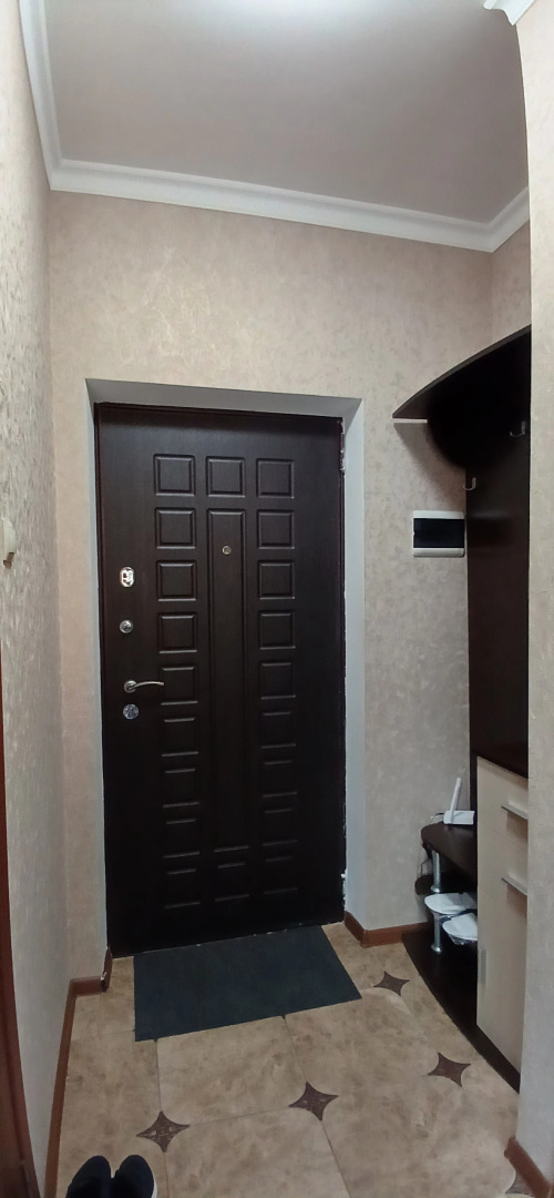 Апартаменты Квартира уютная с спорт площадкой во дворе