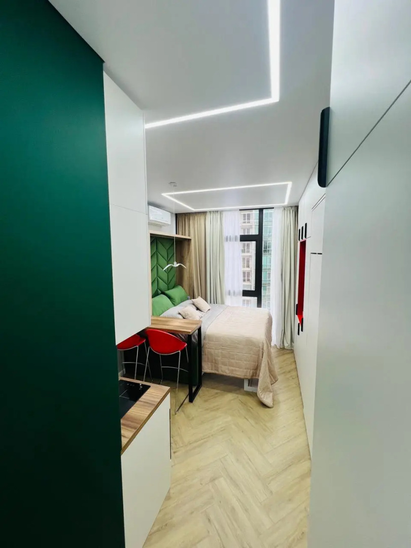 Апартаменты Студия с дизайнерским ремонтом с бассейном на крыше