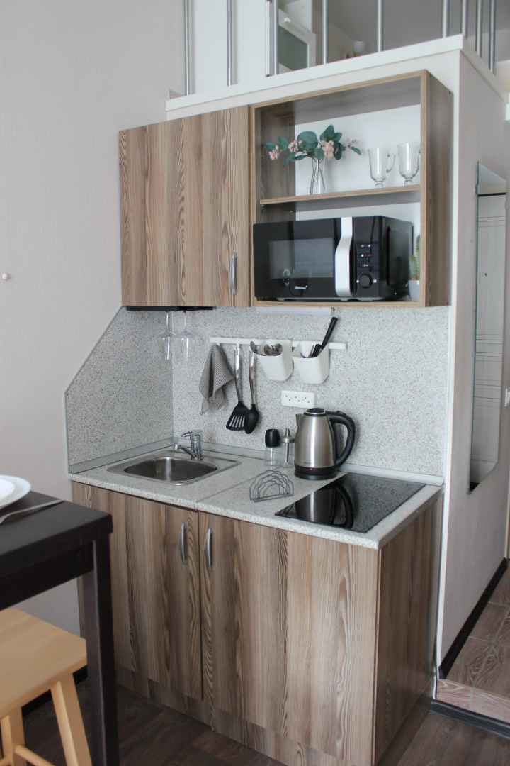 Апартаменты Уютная Двухуровневая Студия в Центре Города