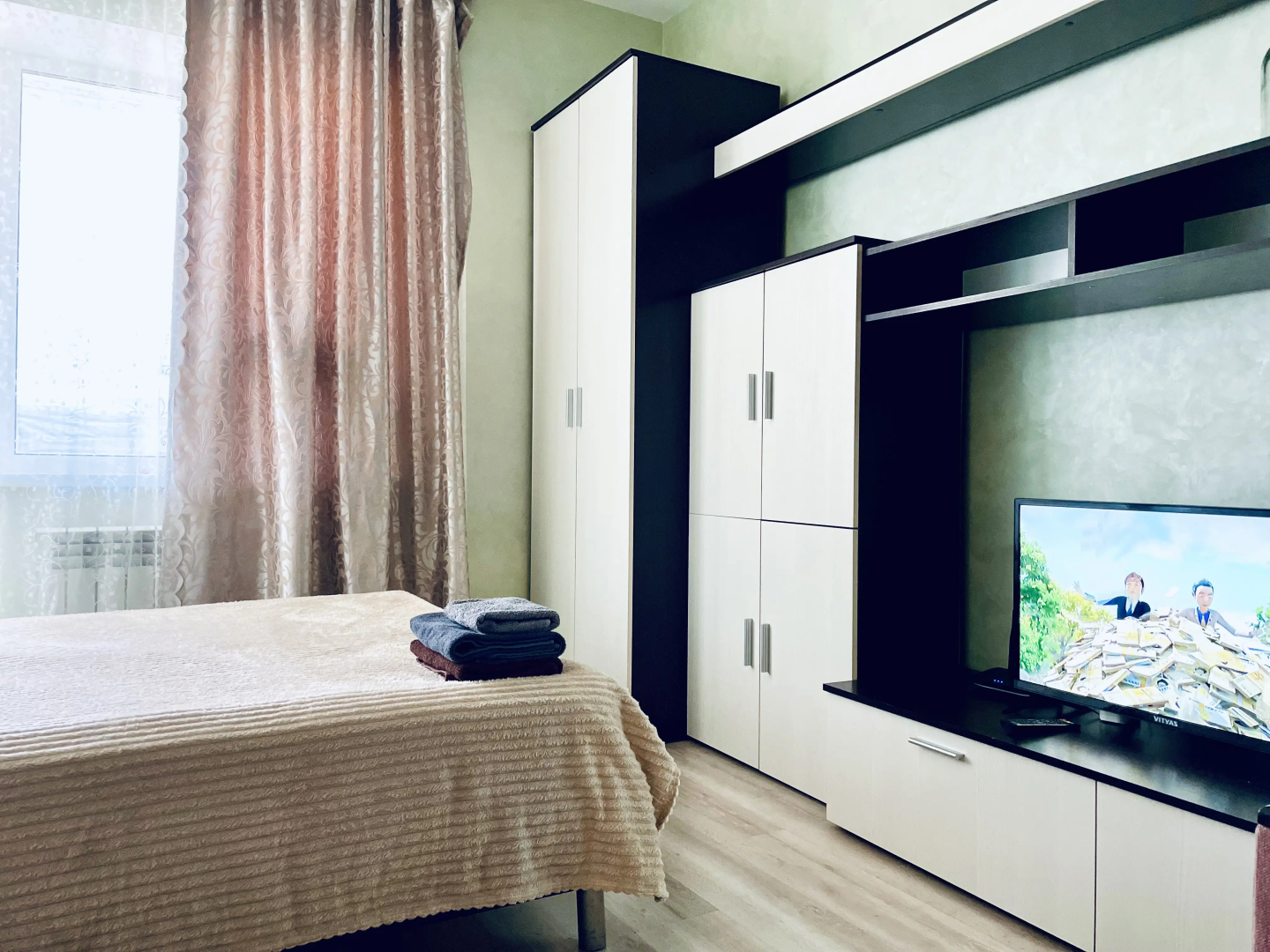 Квартира Уютная студия на Раздольной 1