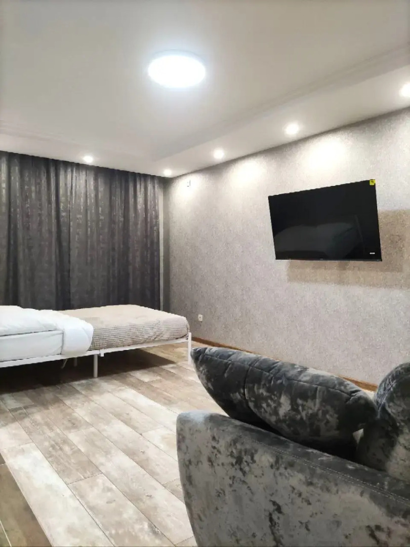 Апартаменты Apato Уютная студия с видом на город и горы