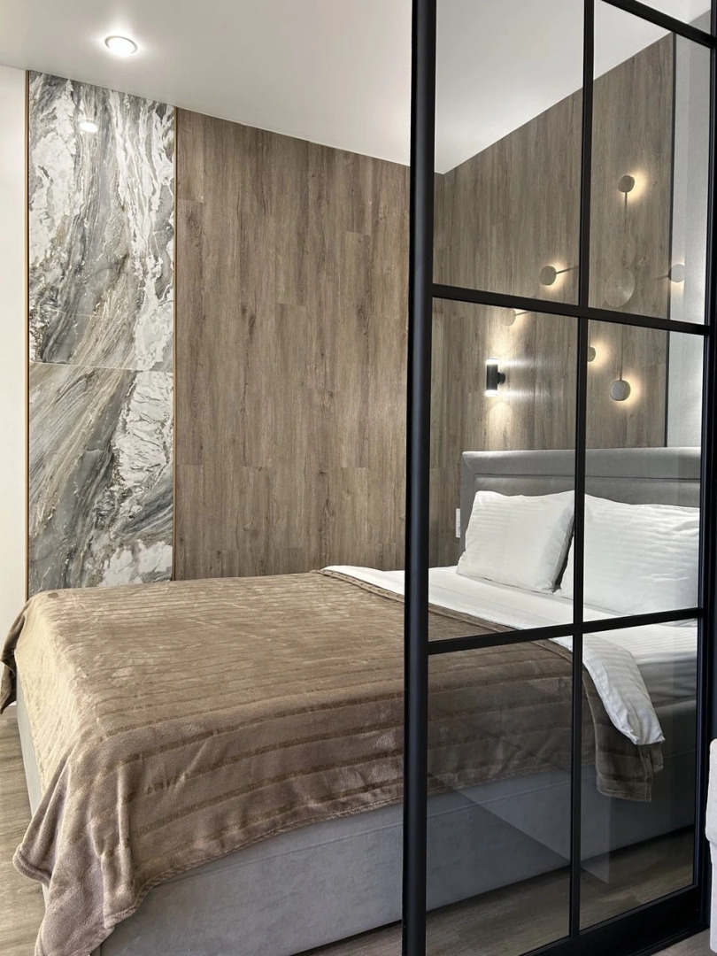 Апартаменты на Мельникайте