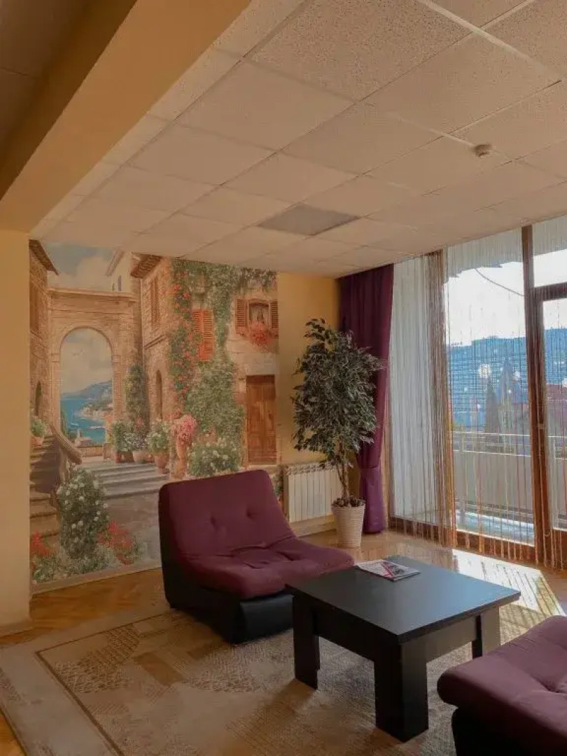 Апартаменты Светлана-Центр у моря с видом на сад магнолий