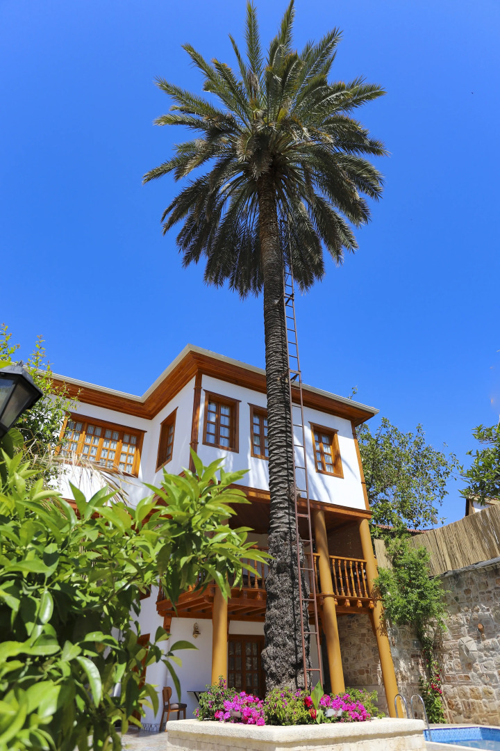 Отель WOO Town Suites