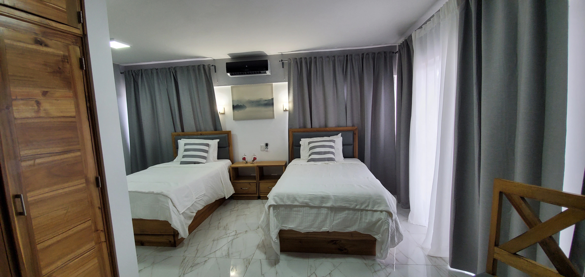 Отель Boca Grande Suites