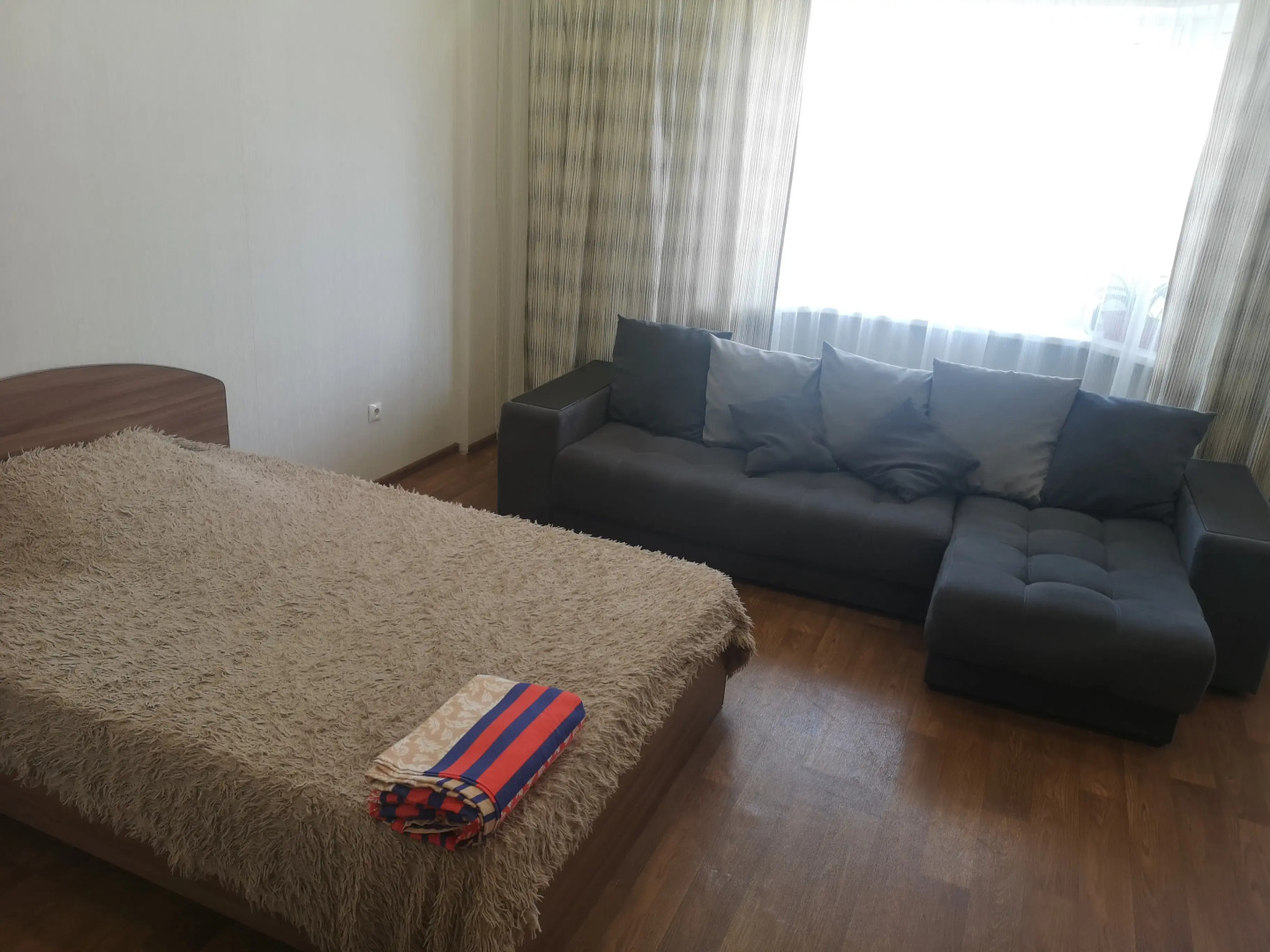 Апартаменты Уютная, чистая студия на Дружбе народов