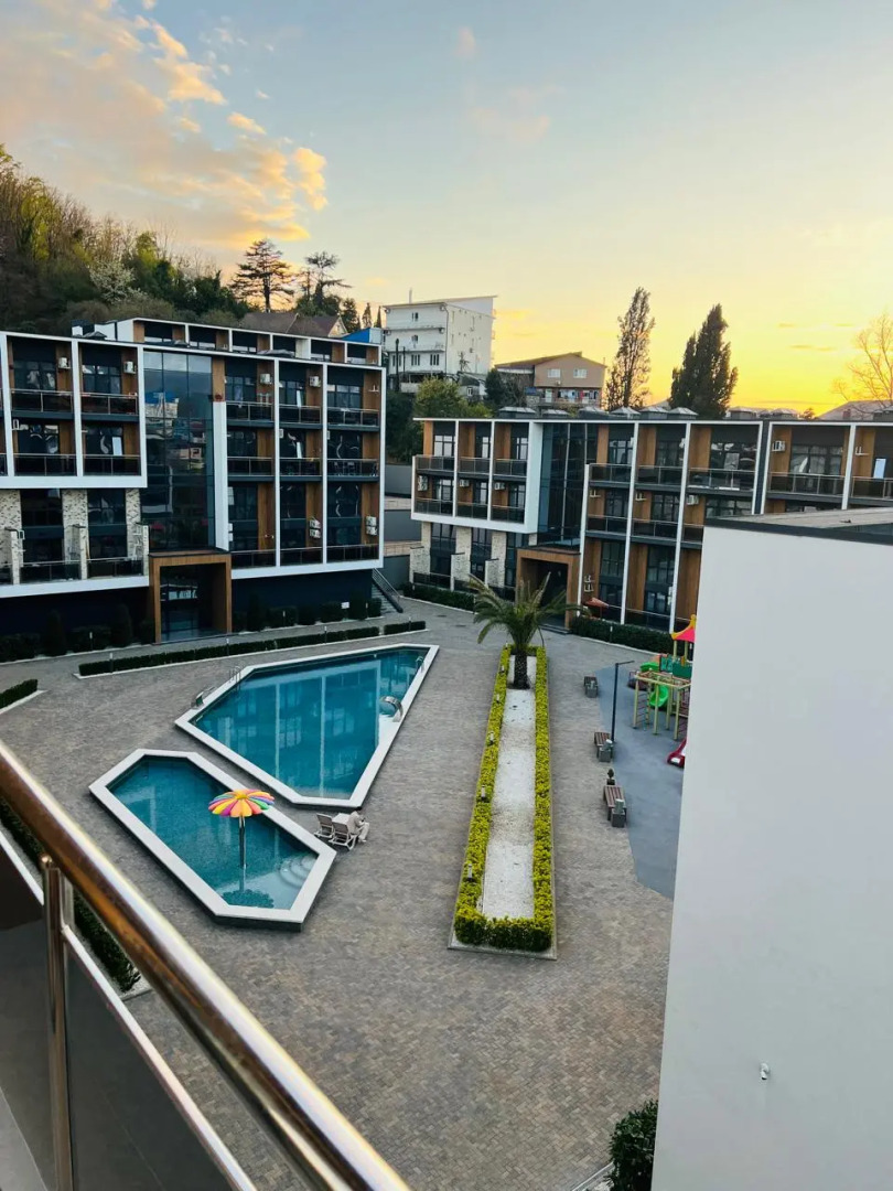 Апартаменты 3х местная студия студия с балконом и бассейном