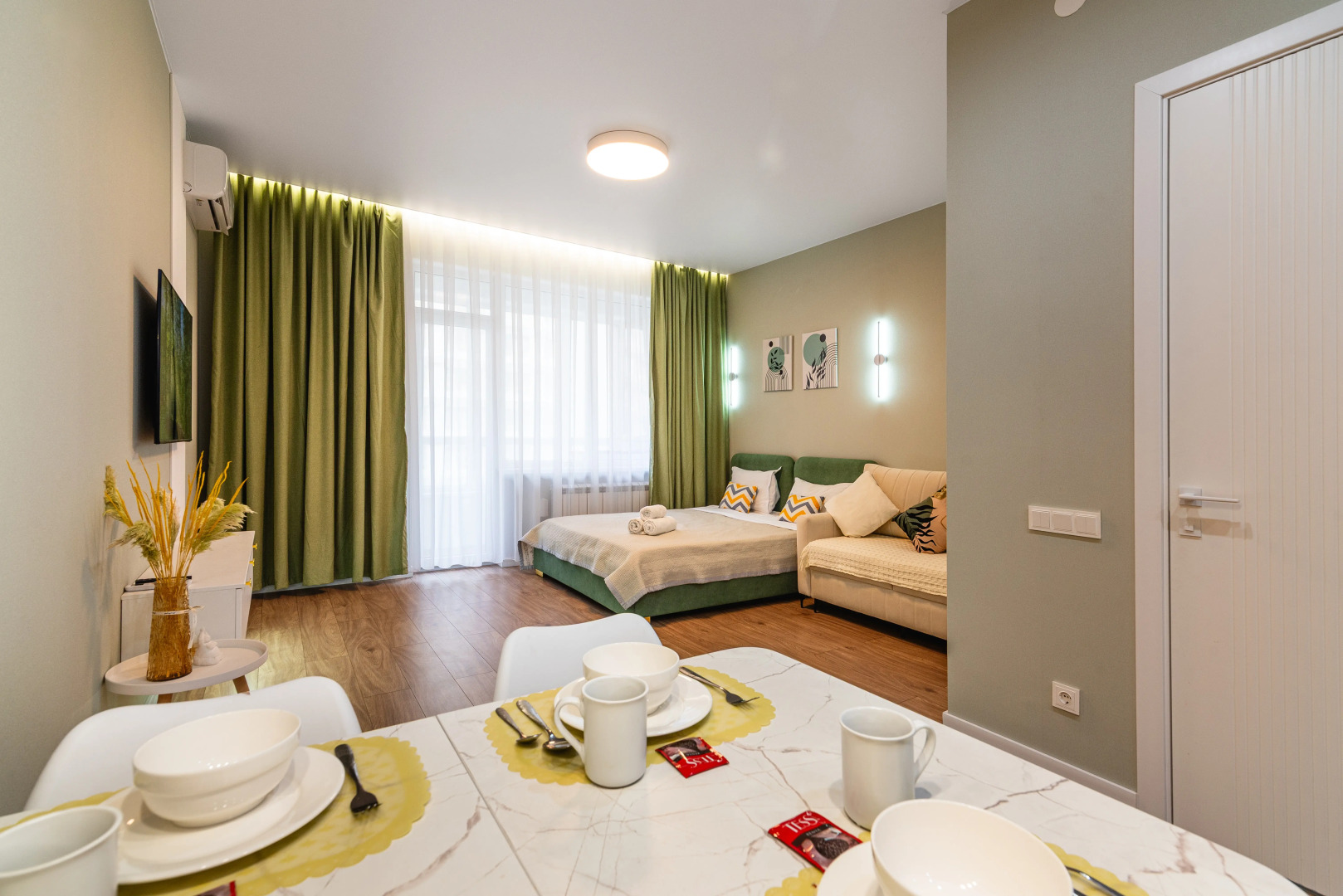 Апартаменты Уютная студия Фисташка в сердце города (170)