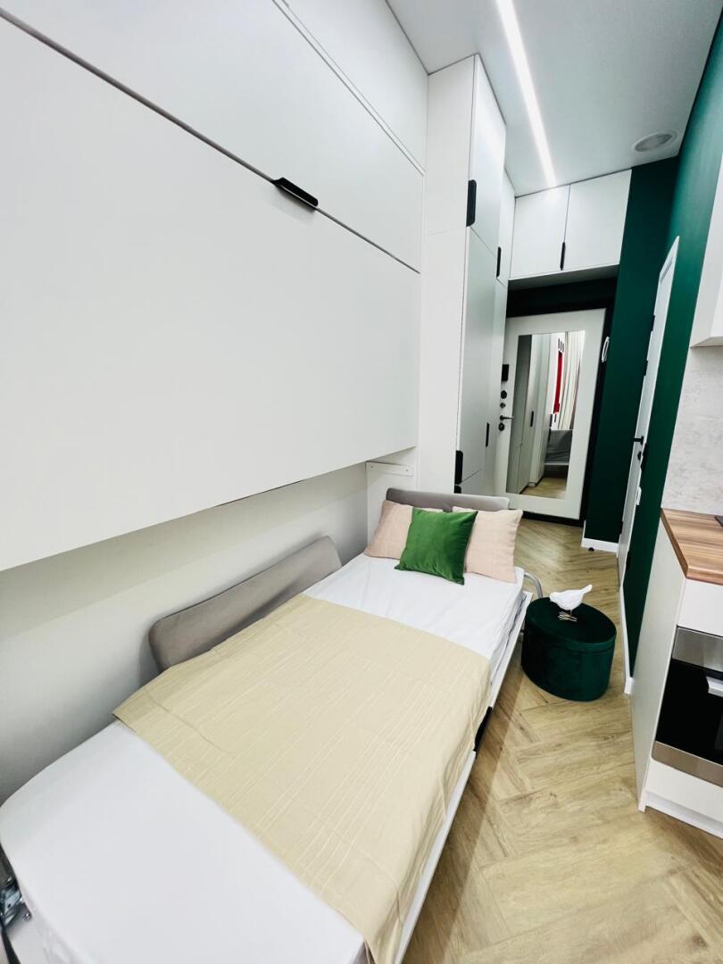 Апартаменты Студия с дизайнерским ремонтом с бассейном на крыше