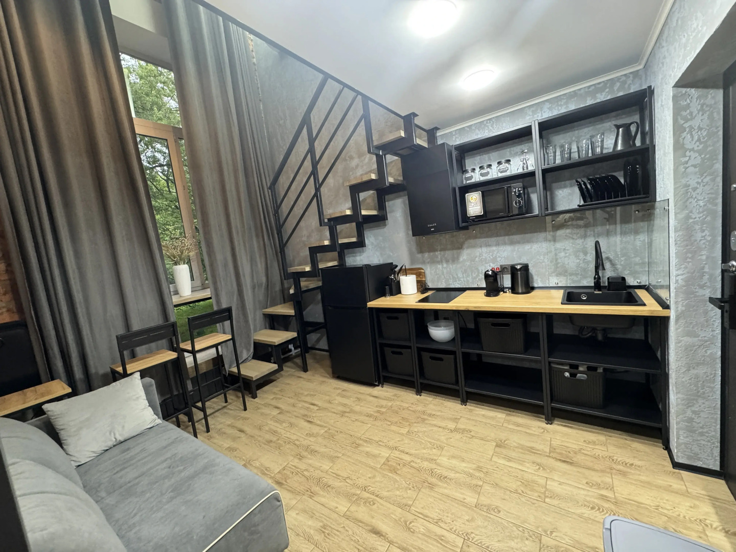 Апартаменты Двухуровневая студия с двумя санузлами в парке