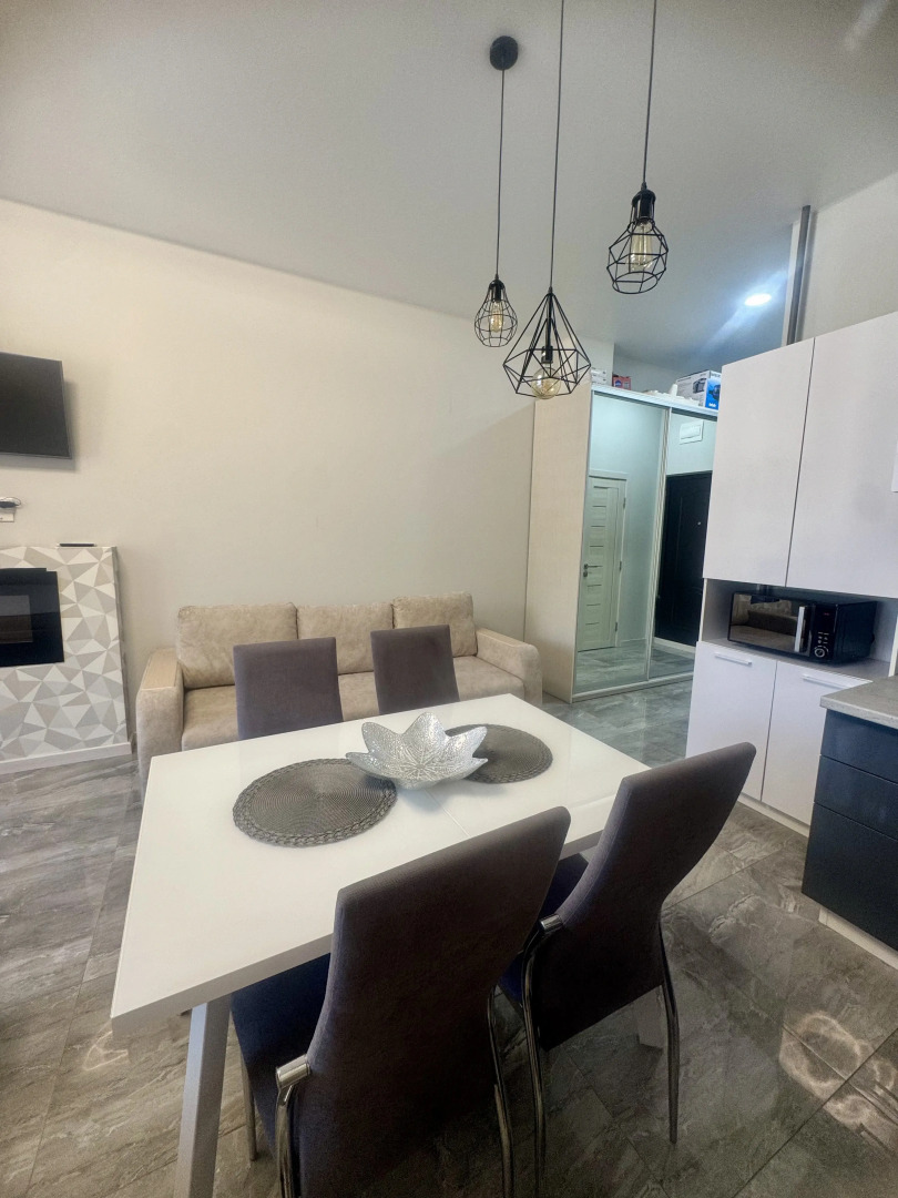 Квартира Просторная студия с террасой напротив отеля Мариотт