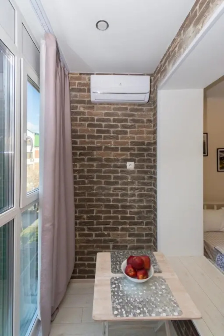 Апартаменты Мини студия с Панорамным Окном и парковкой