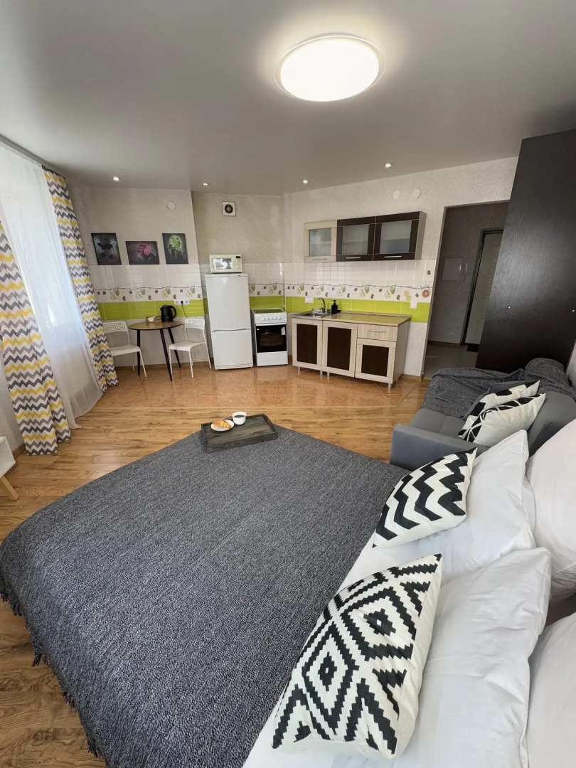 Квартира Уютна студия не далеко от зоопарка.