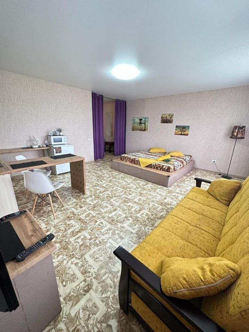 Квартира Уютная студия рядом с горoдской библиoтекой