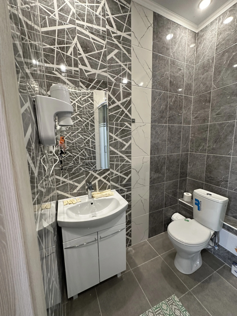 Отель 104 Rooms