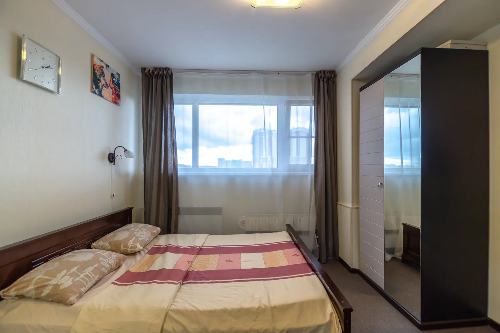 Апартаменты Истоман для Двоих с видом на город