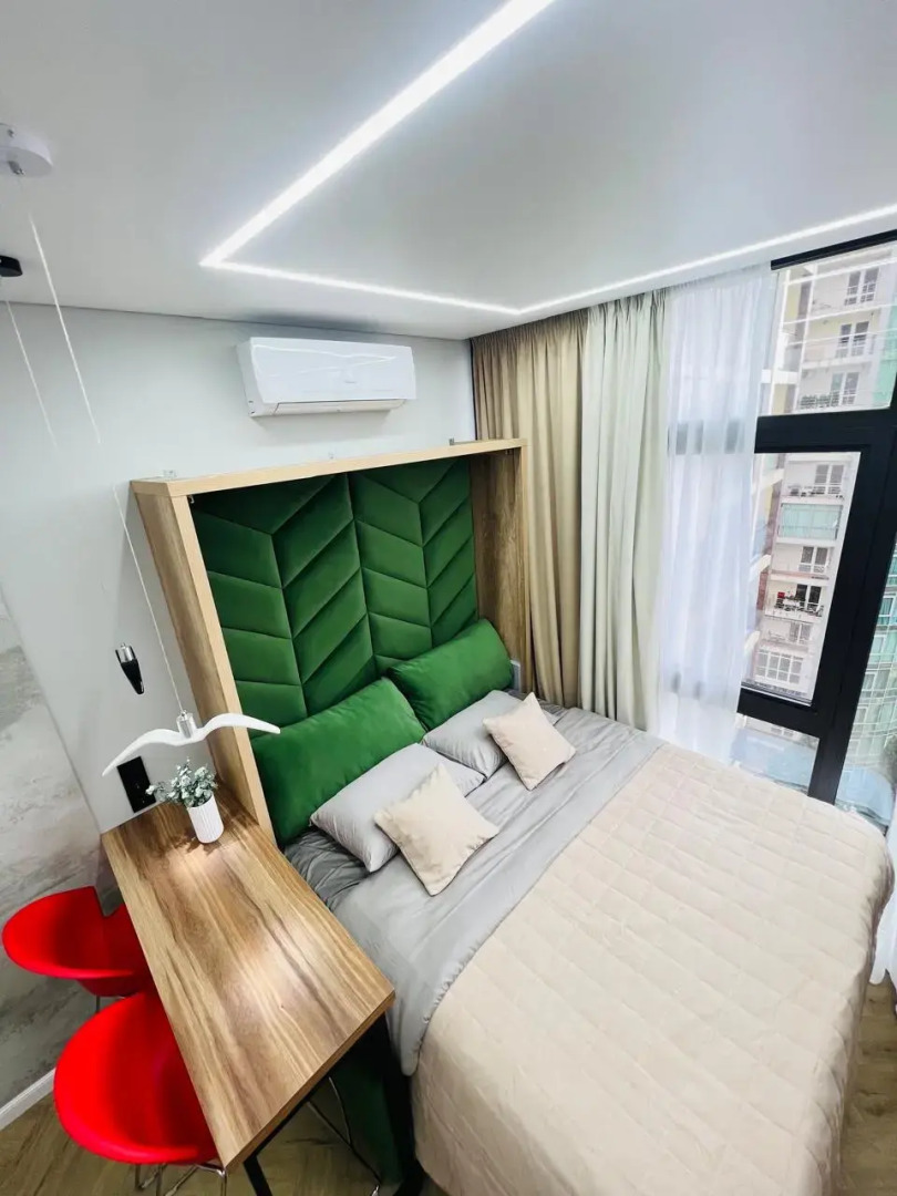 Апартаменты Студия с дизайнерским ремонтом с бассейном на крыше