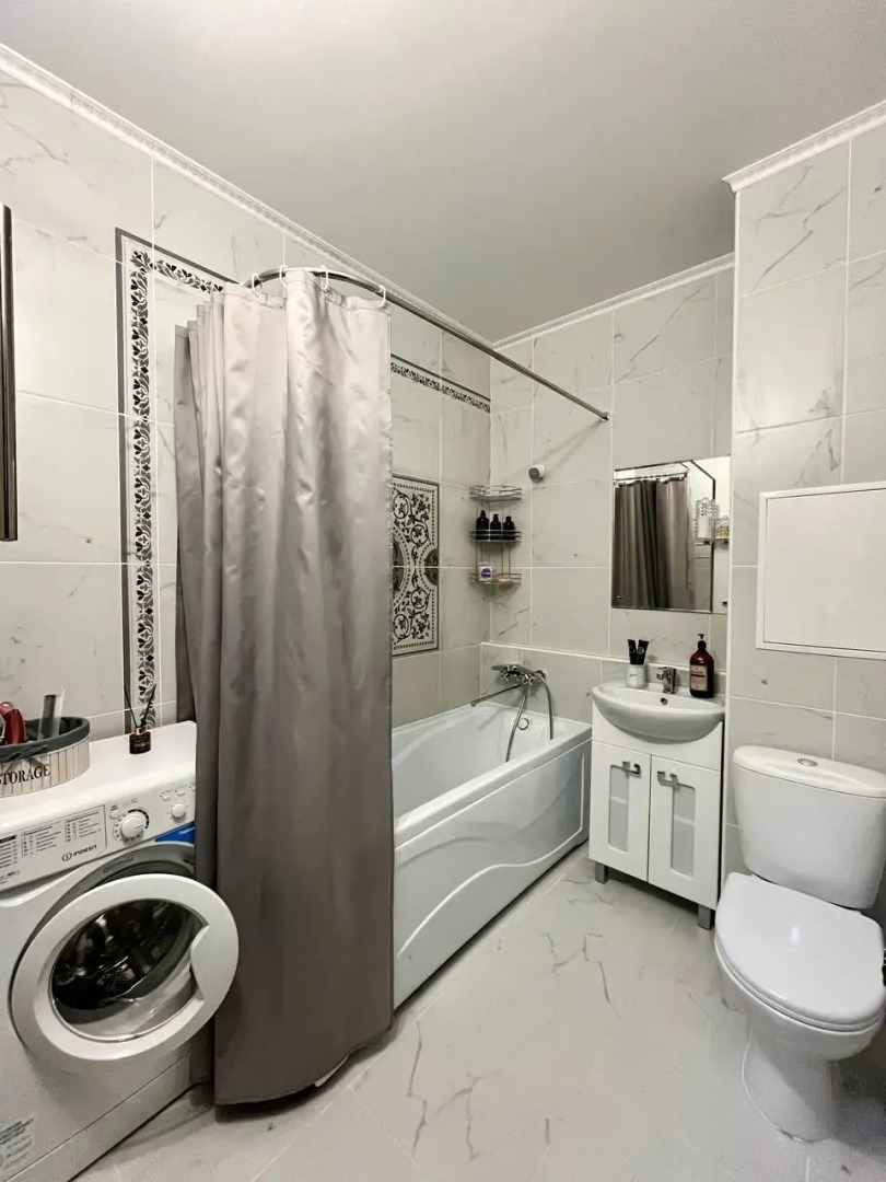 Квартира Уютная студия в 5 минутах от ТРЦ Планета