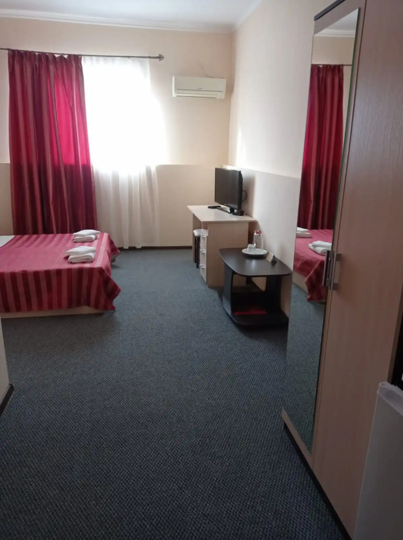 Отель Максимус