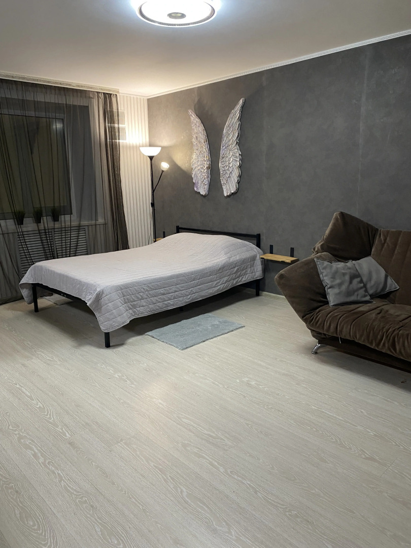 Апартаменты Уютная Студия на Коммунистическом проспекте