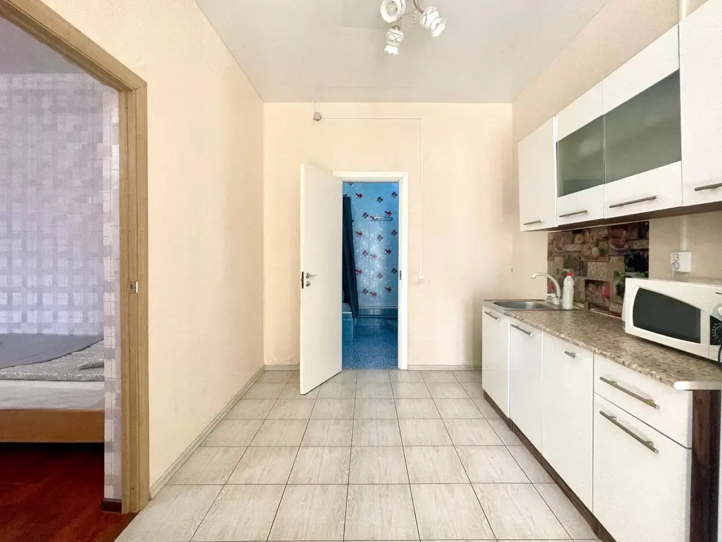 Апартаменты с кухней-гостиной и отдельной спальней (4 односпальные кровати, можно сдвинуть в двуспальные)