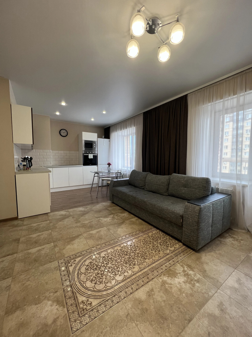 Квартира студии Be Home на Строительном