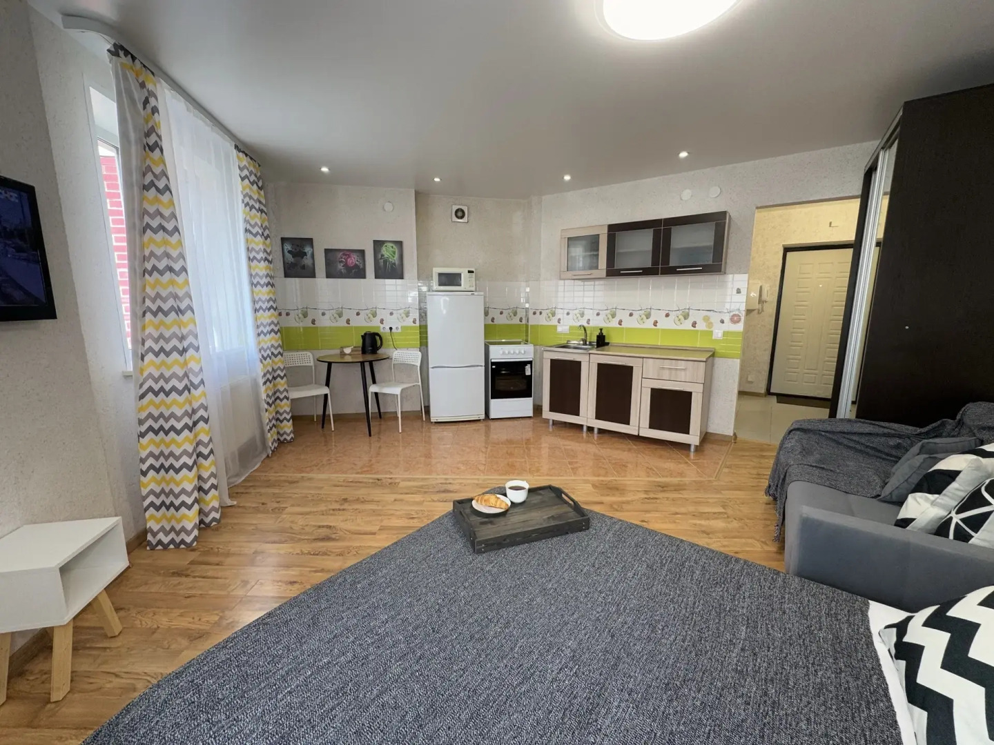 Квартира Уютна студия не далеко от зоопарка.