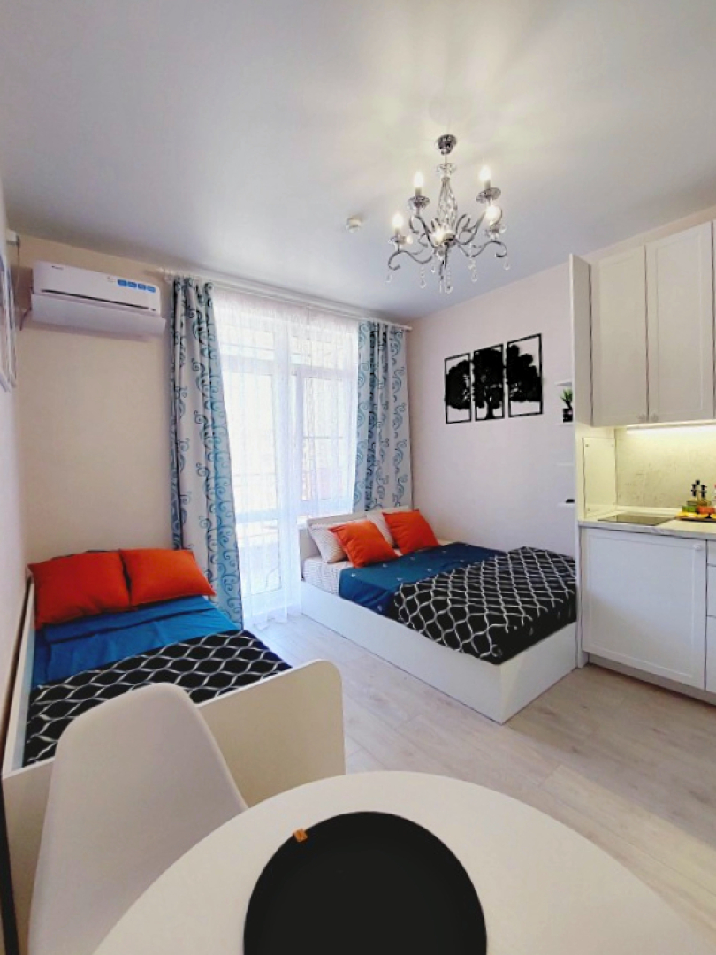 Квартира Уютная студия с террасой в ЖК Холидэй Хаус