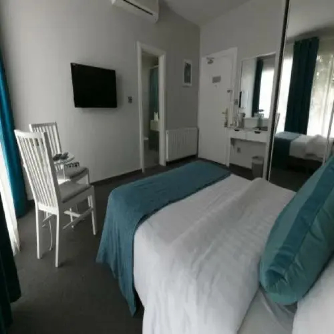 Отель The Conroy Boutique Hotel