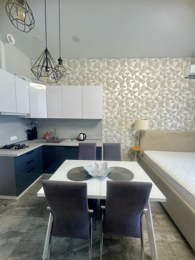 Квартира Просторная студия с террасой напротив отеля Мариотт