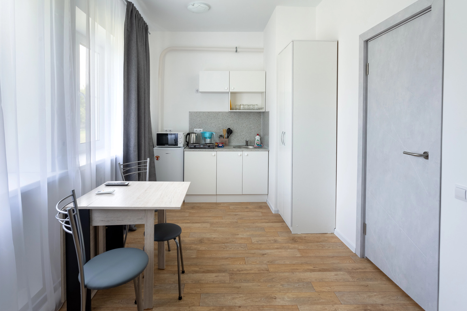 Апартаменты ОK на Буханцева 66