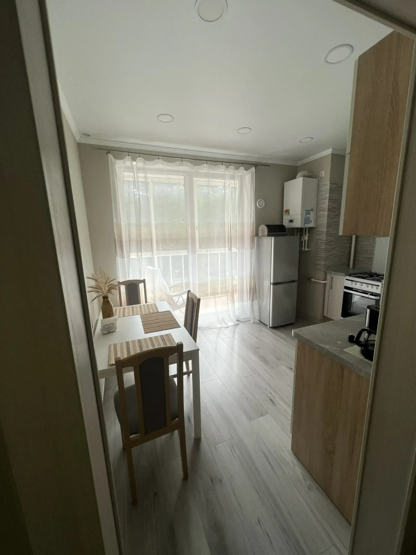 Апартаменты с видом на сосновый лес