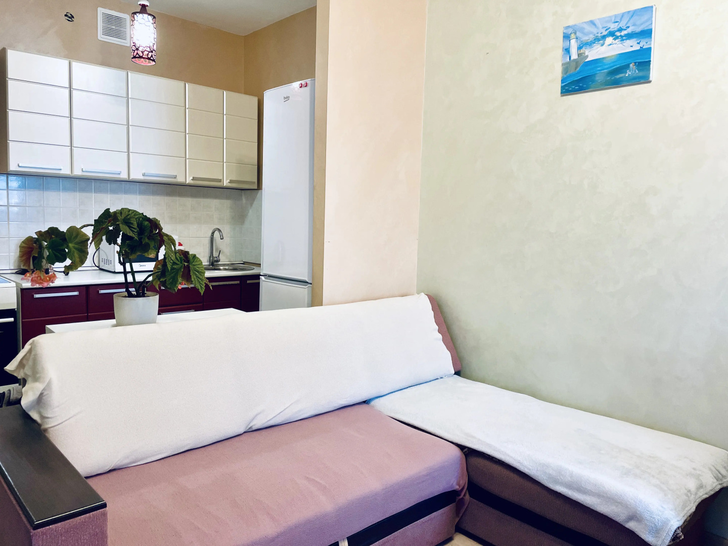 Квартира Уютная студия на Раздольной 1