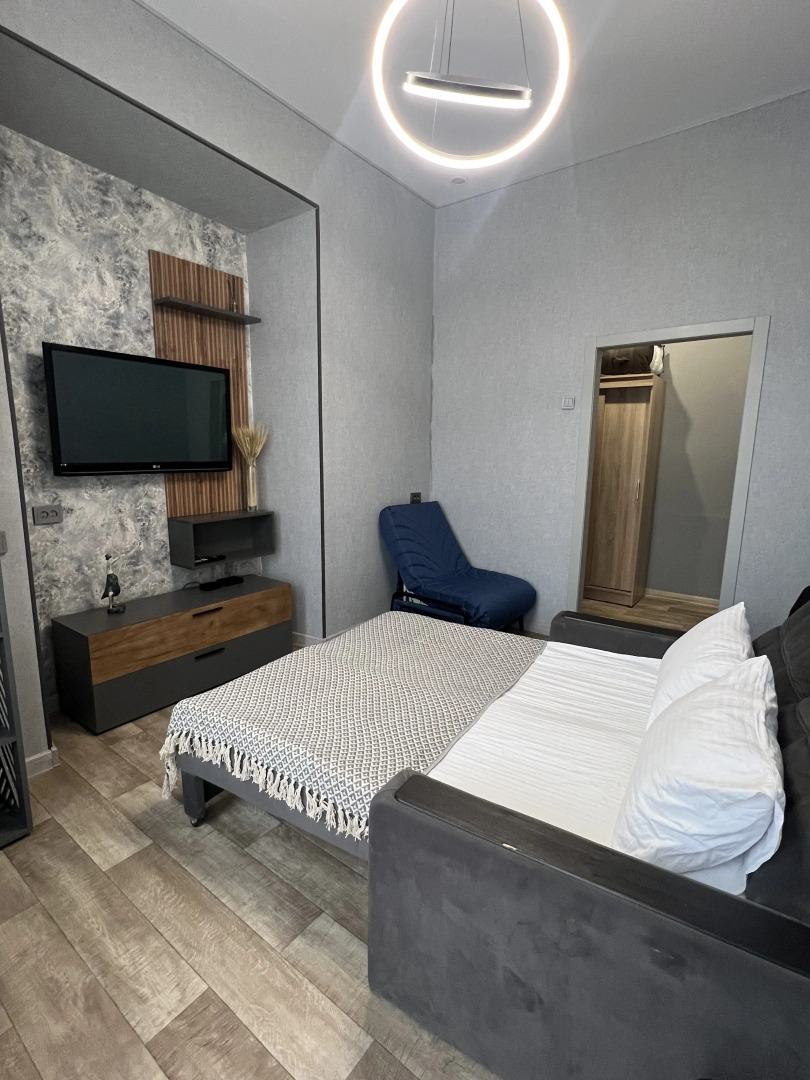 Квартира Уютный Лофт с балконом на главной улице Столицы Закатов