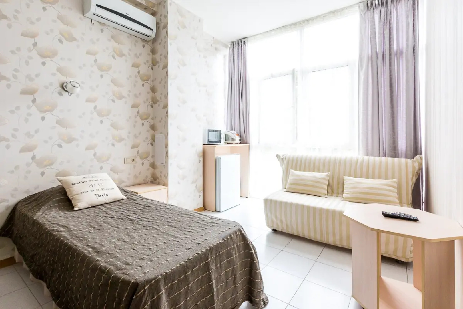 Апартаменты Светлана-Центр у моря с видом на сад магнолий